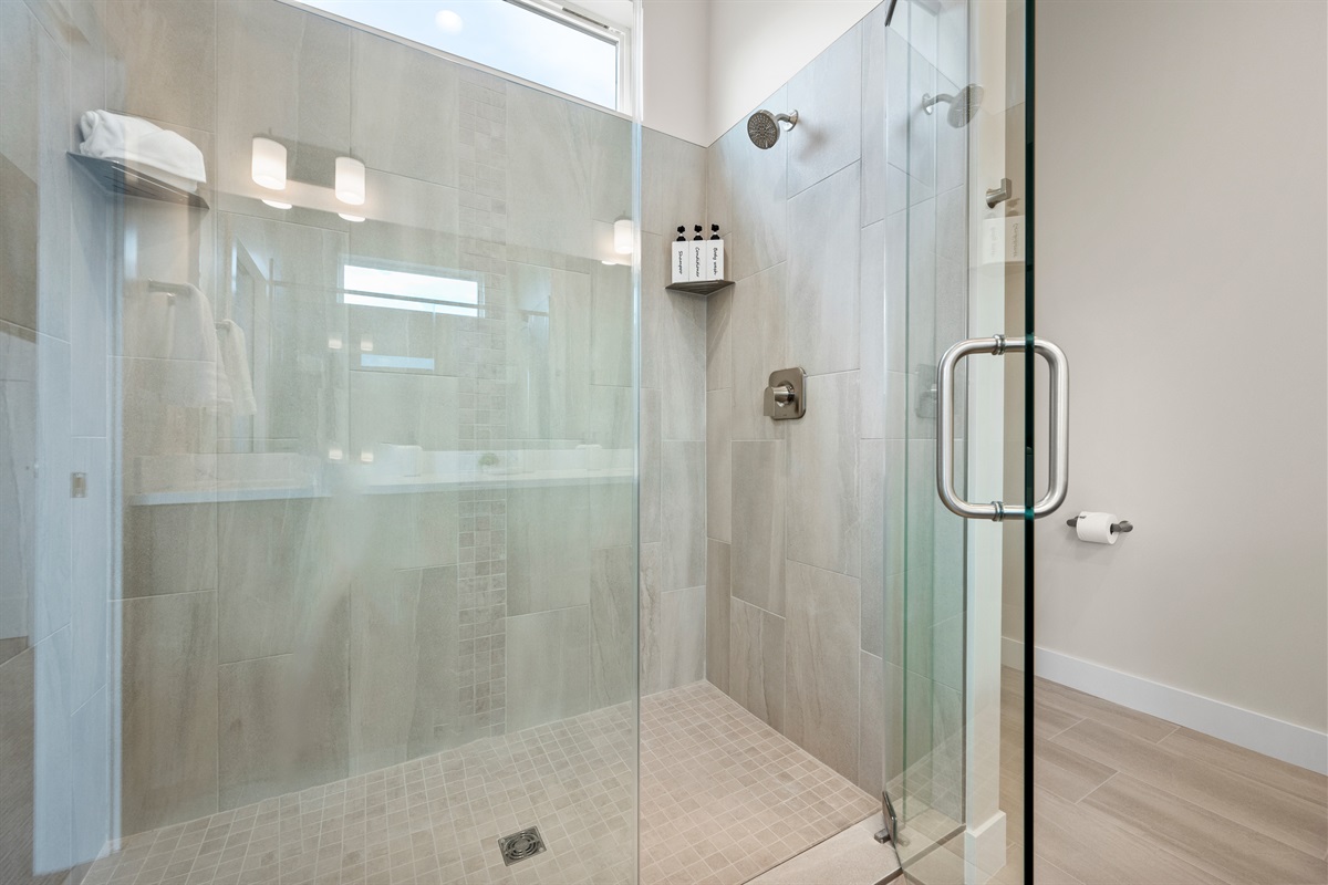 Sleek walk-in glass shower.