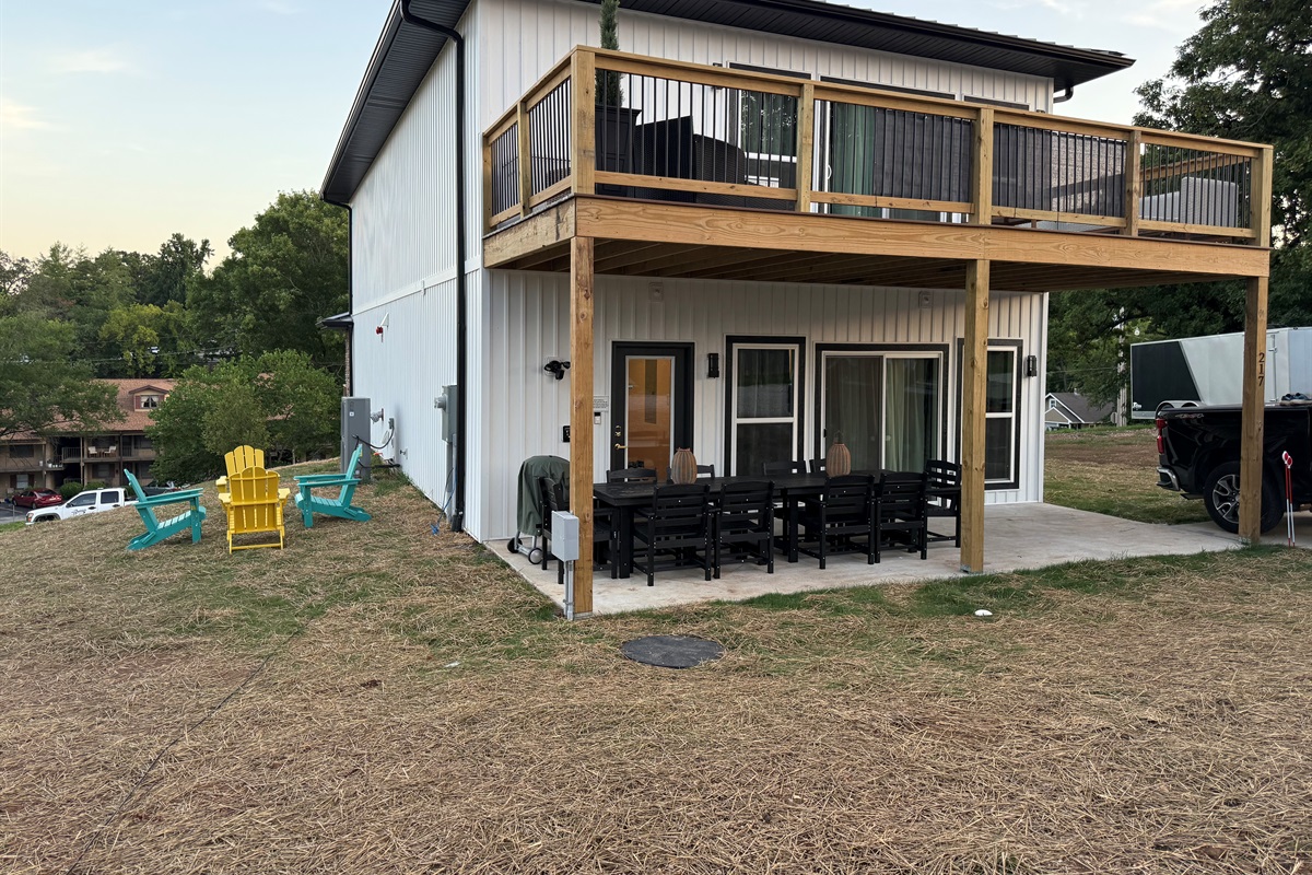 Upper patio and lower deck offer lots of seating for relaxing  or entertaining 
