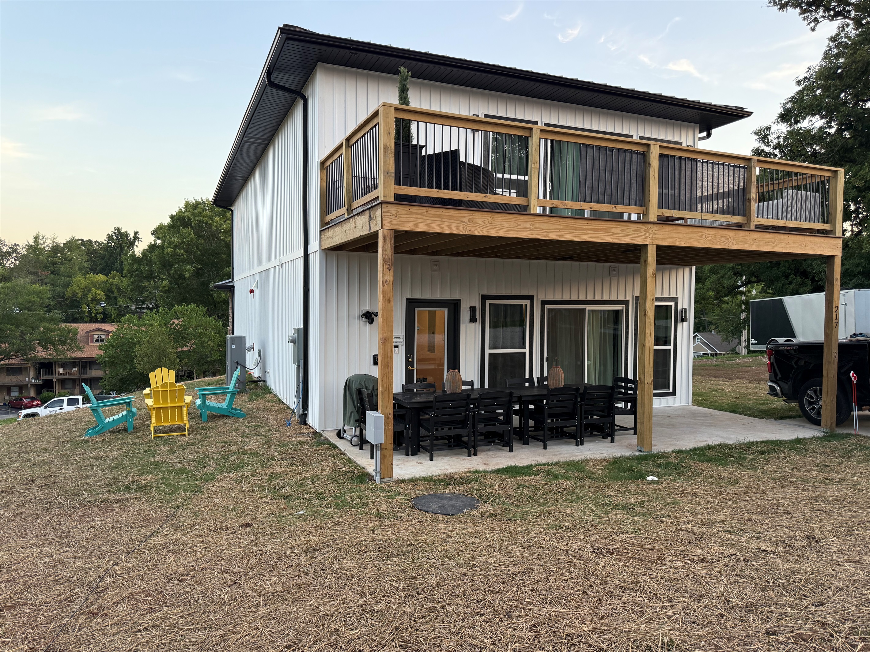 Upper patio and lower deck offer lots of seating for relaxing  or entertaining 