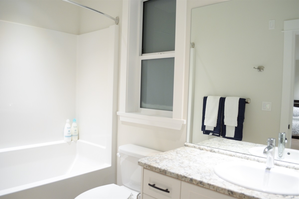 Primary ensuite with tub and vanity