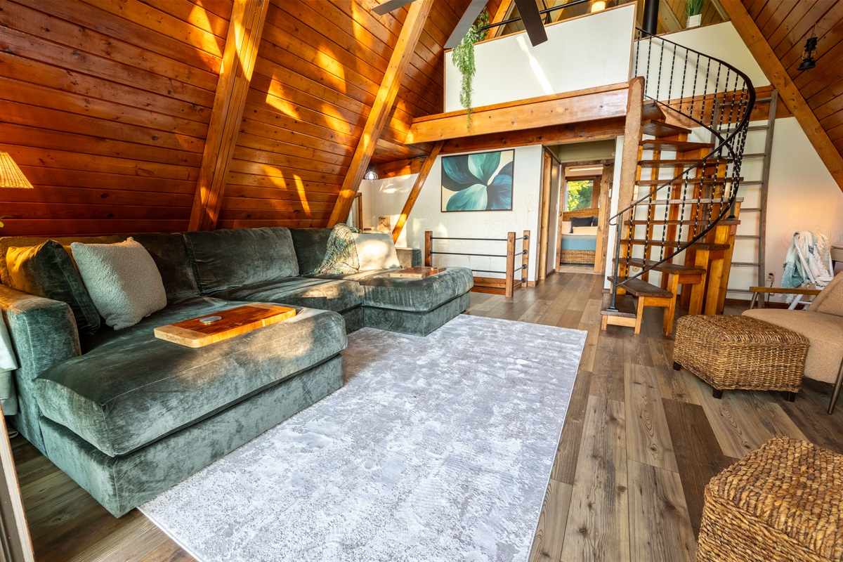 Fun spiral staircase to loft bedroom and optional room darkening curtains.