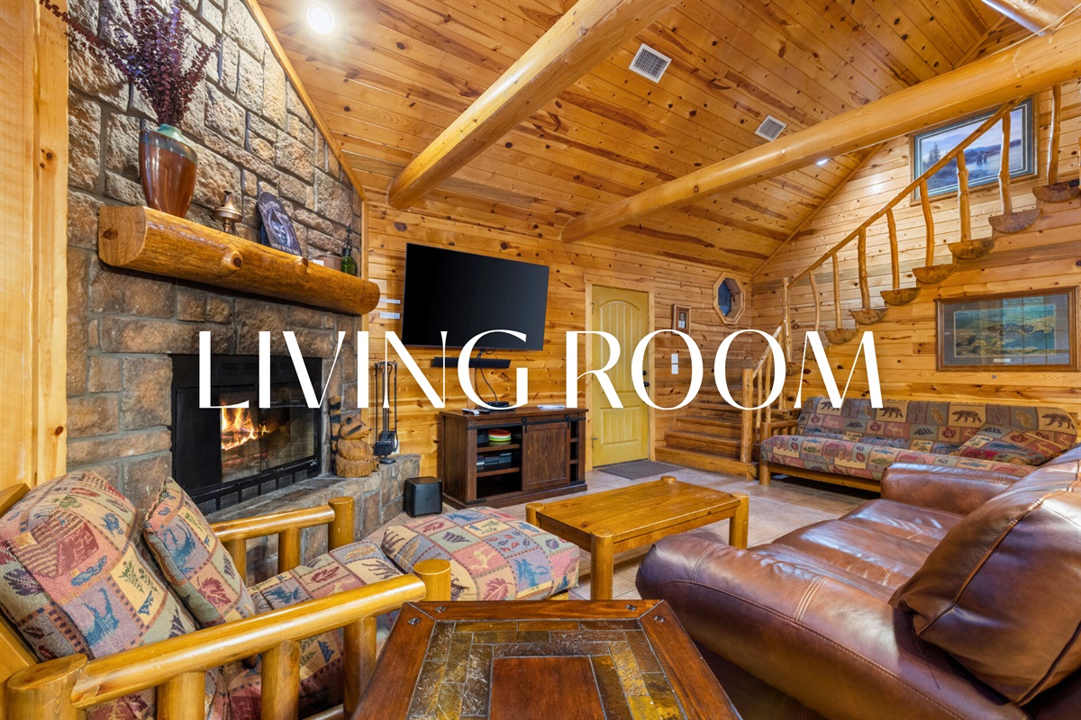 Living room with comfy seating and cabin décor.