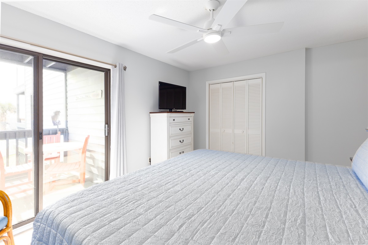 Sliding doors and soft linens create the perfect relaxation space