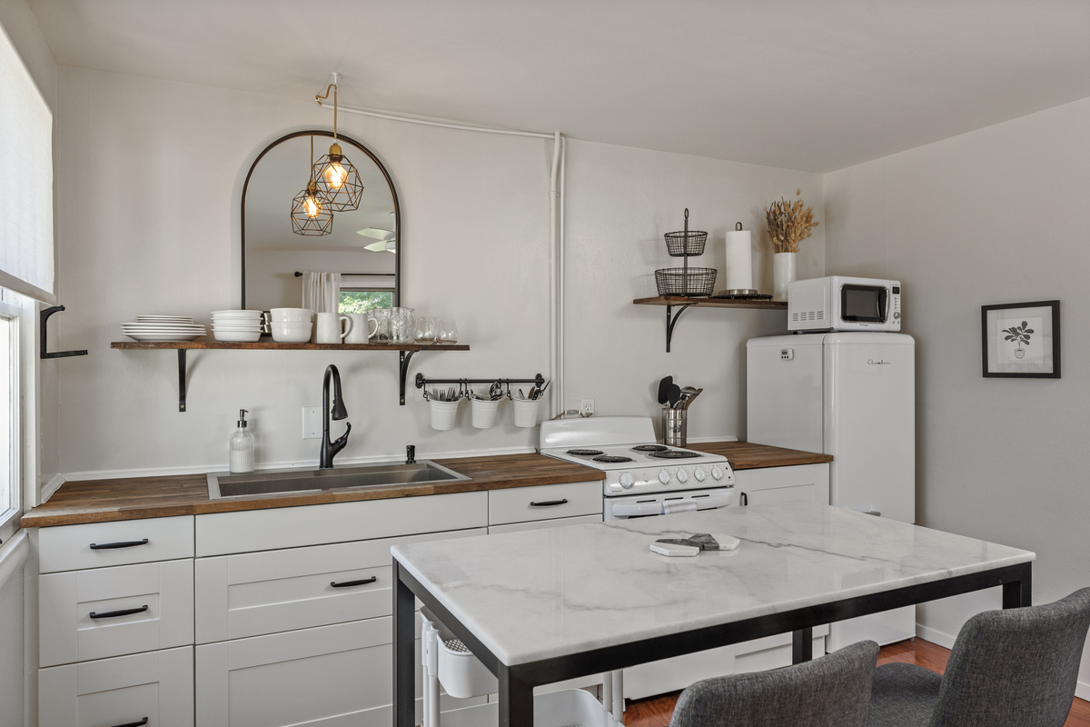 Well stocked kitchenette to make a variety of meals with the apartment size range and oven.  