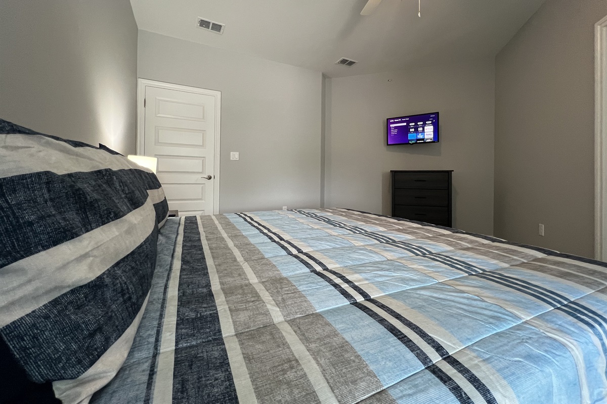 Primary Bedroom with King Bed and Smart TV