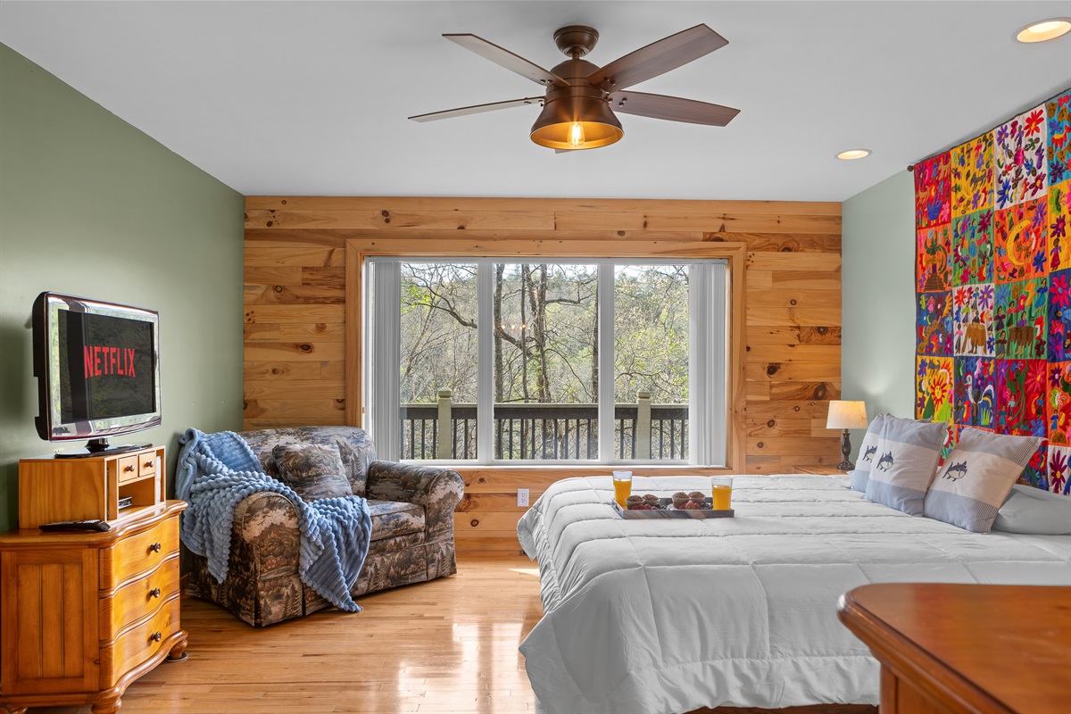 King Bedroom 2: Relax in vibrant decor with scenic views and Netflix at your fingertips!
