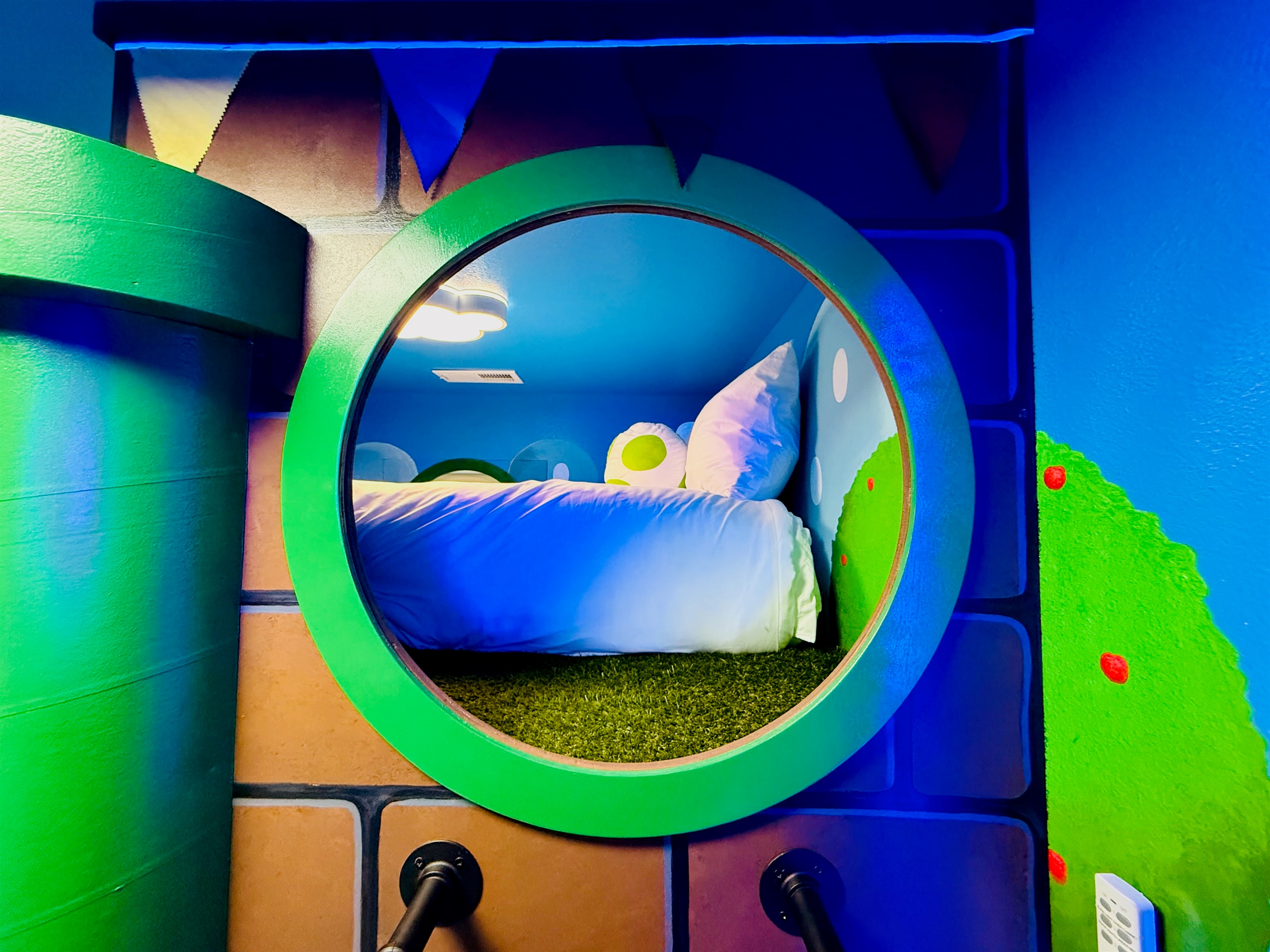 Peek in at the queen bed, accessible by ladder or stairs. 