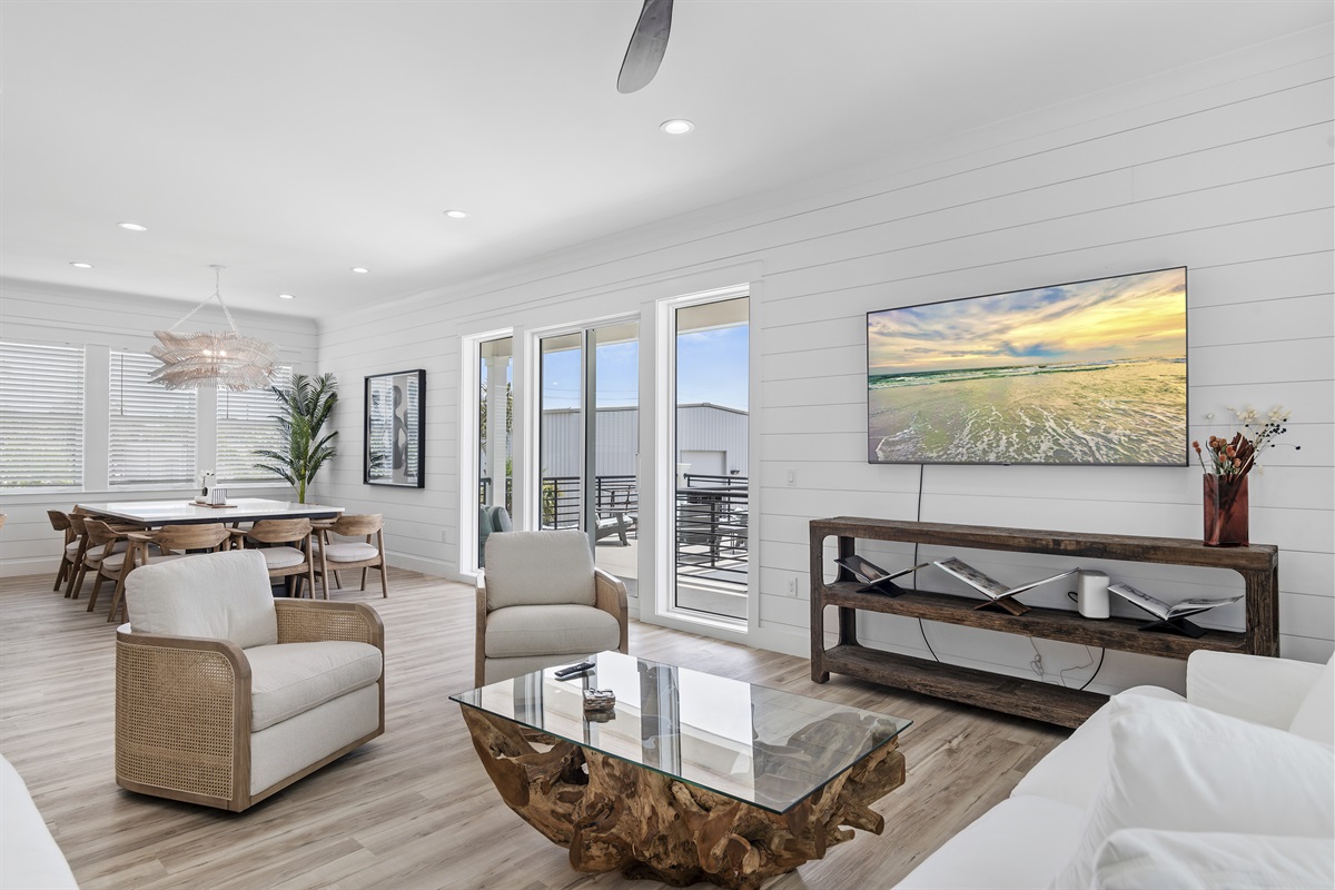 Cozy living area with a large Smart TV, and comfortable sofa 