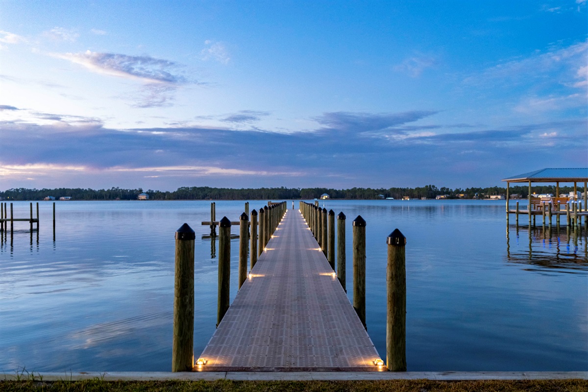 Tranquil waterfront pier with peaceful sunset views and calm evening vibes.