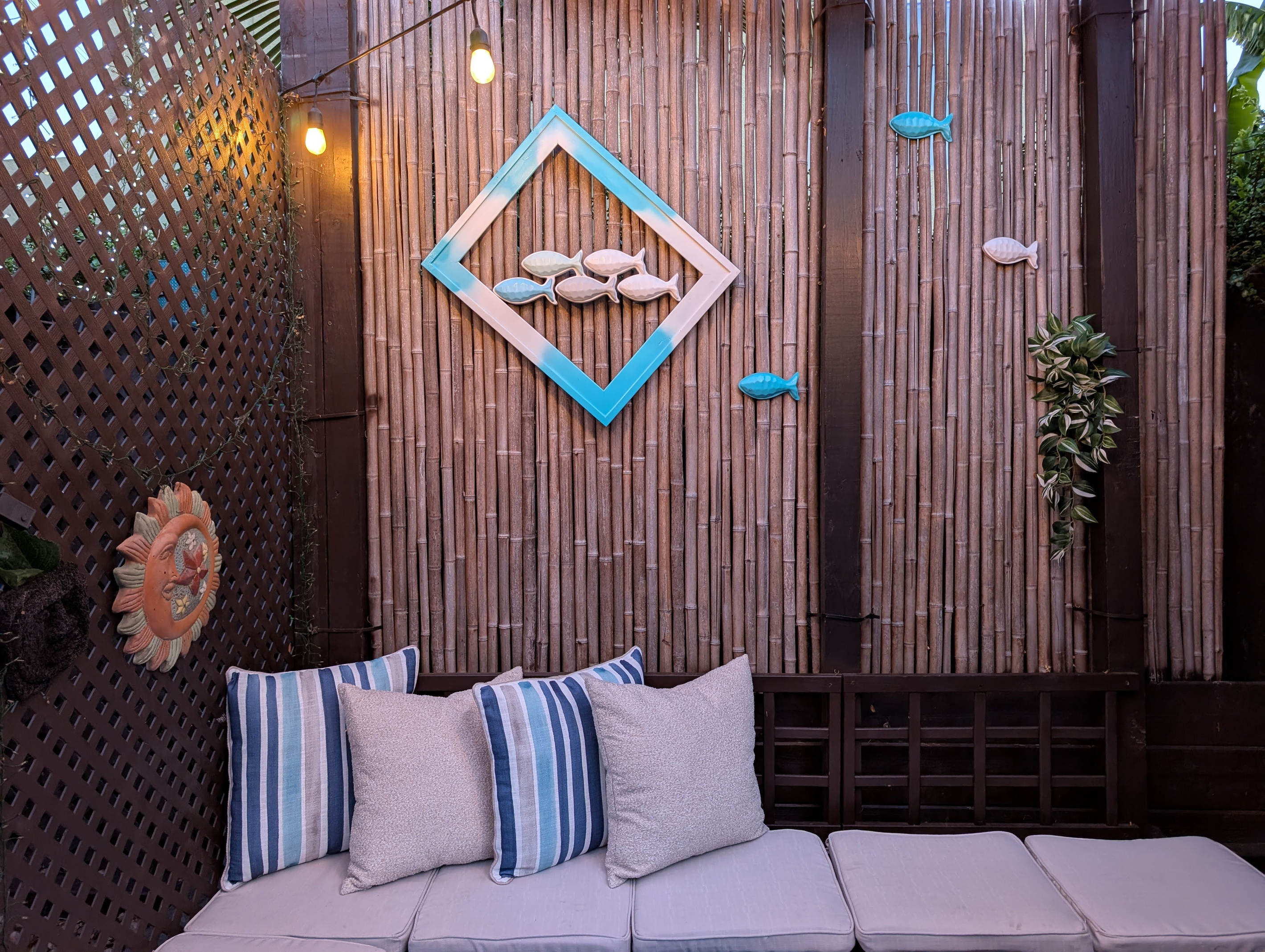 Cozy outdoor lounge with beach-inspired décor.