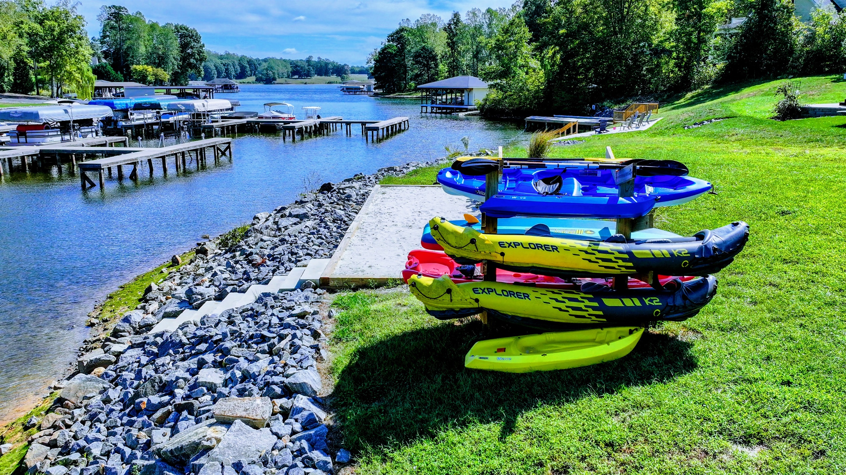 Soak in stunning lake views from this private waterfront oasis! Relax in Adirondack chairs, fish off the shore, or watch boats glide by. Launch your adventure from the dock and enjoy breathtak