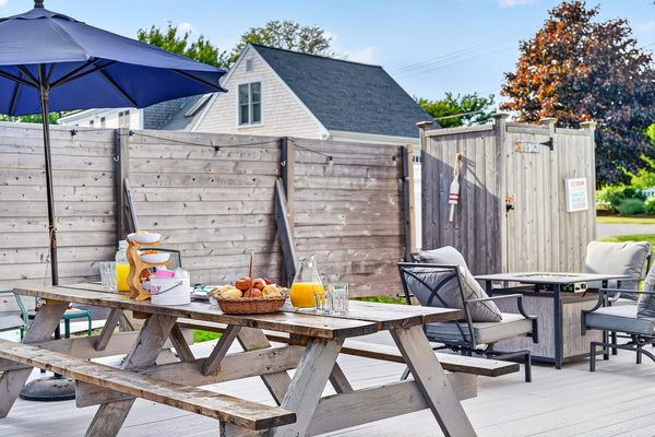 Private backyard oasis with dining, lounge seating, and plenty of space to gather with family and friends.