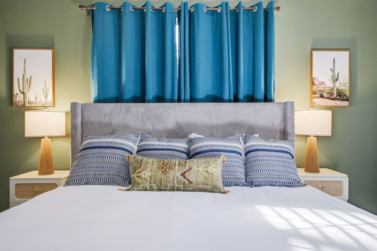 First-floor bedroom with king bed and Roku TV