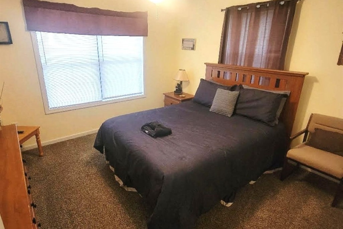 Bedroom 3-Comfortable guest room with queen bed & flat screen TV