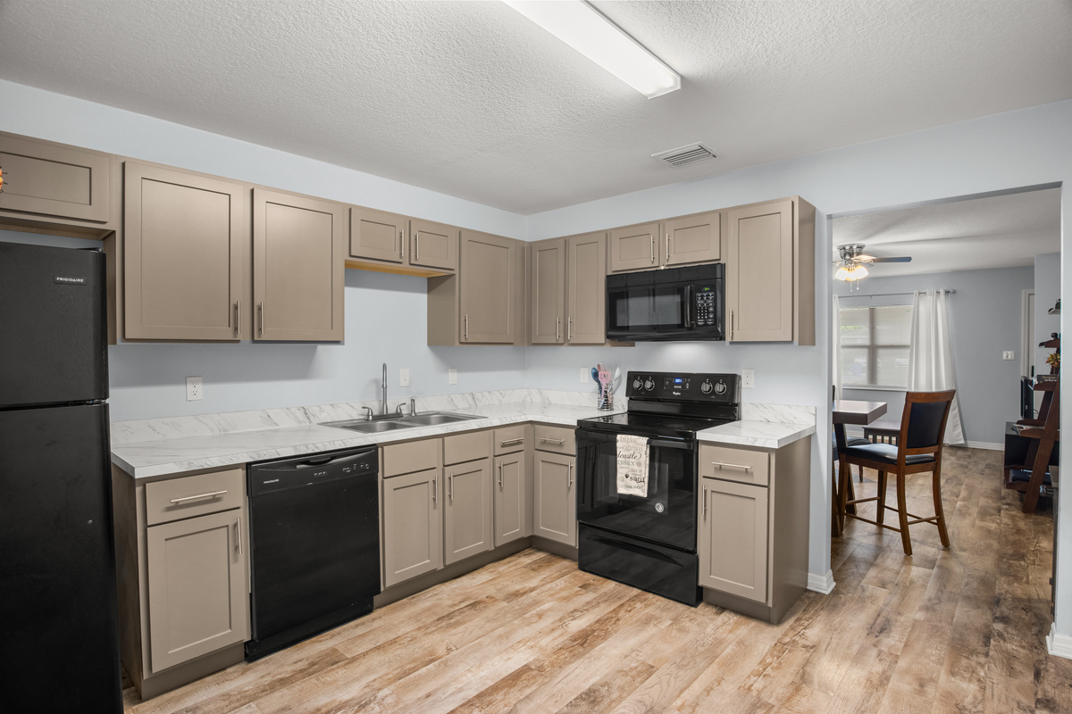 The kitchen connects to the family room.
