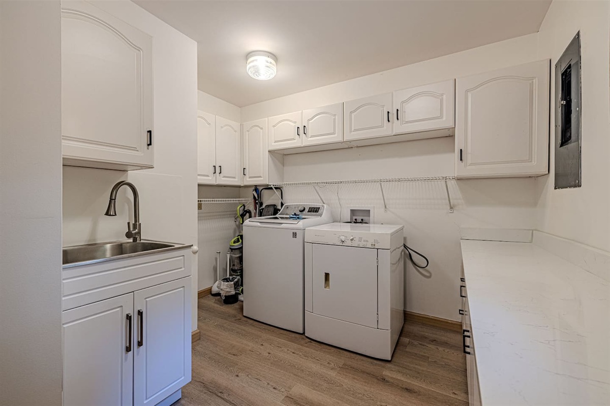 With a washer, dryer, utility sink, and ample storage, the oversized laundry room adds convenience and comfort to your stay.