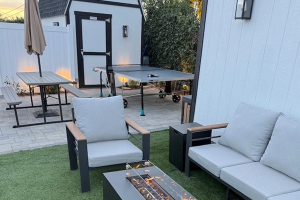 Backyard Seating and Fire Table. Outdoor Dining Table and Ping Pong Table