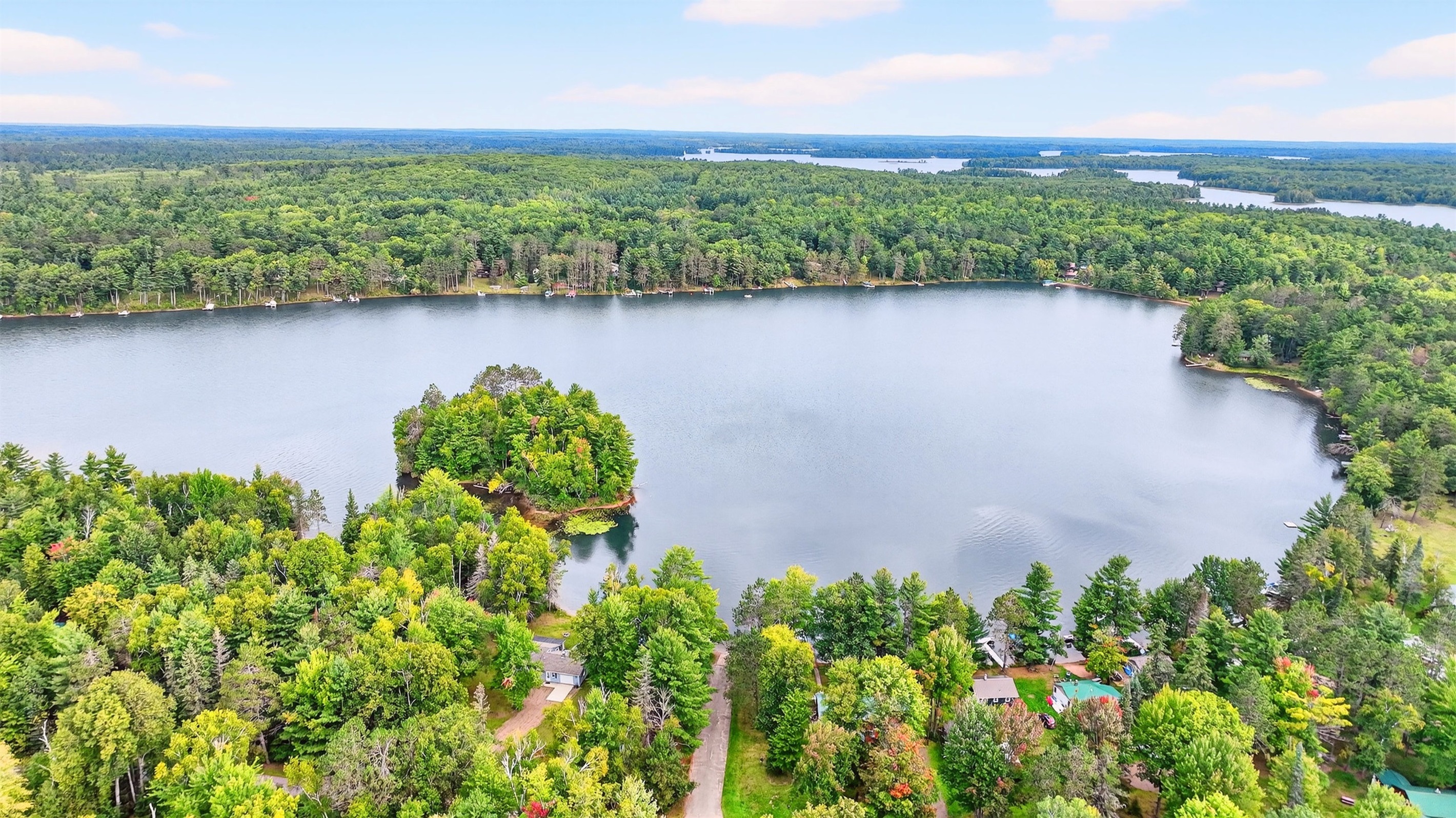 Blueberry lake is 292 acres - big enough for boating, but small enough to remain a pretty quiet lake. If you want larger water, the Chippewa Flowage (in background of this photo) is just a short drive away.