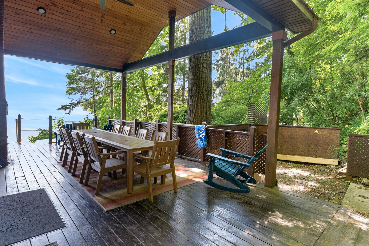 Covered deck with outdoor dining table