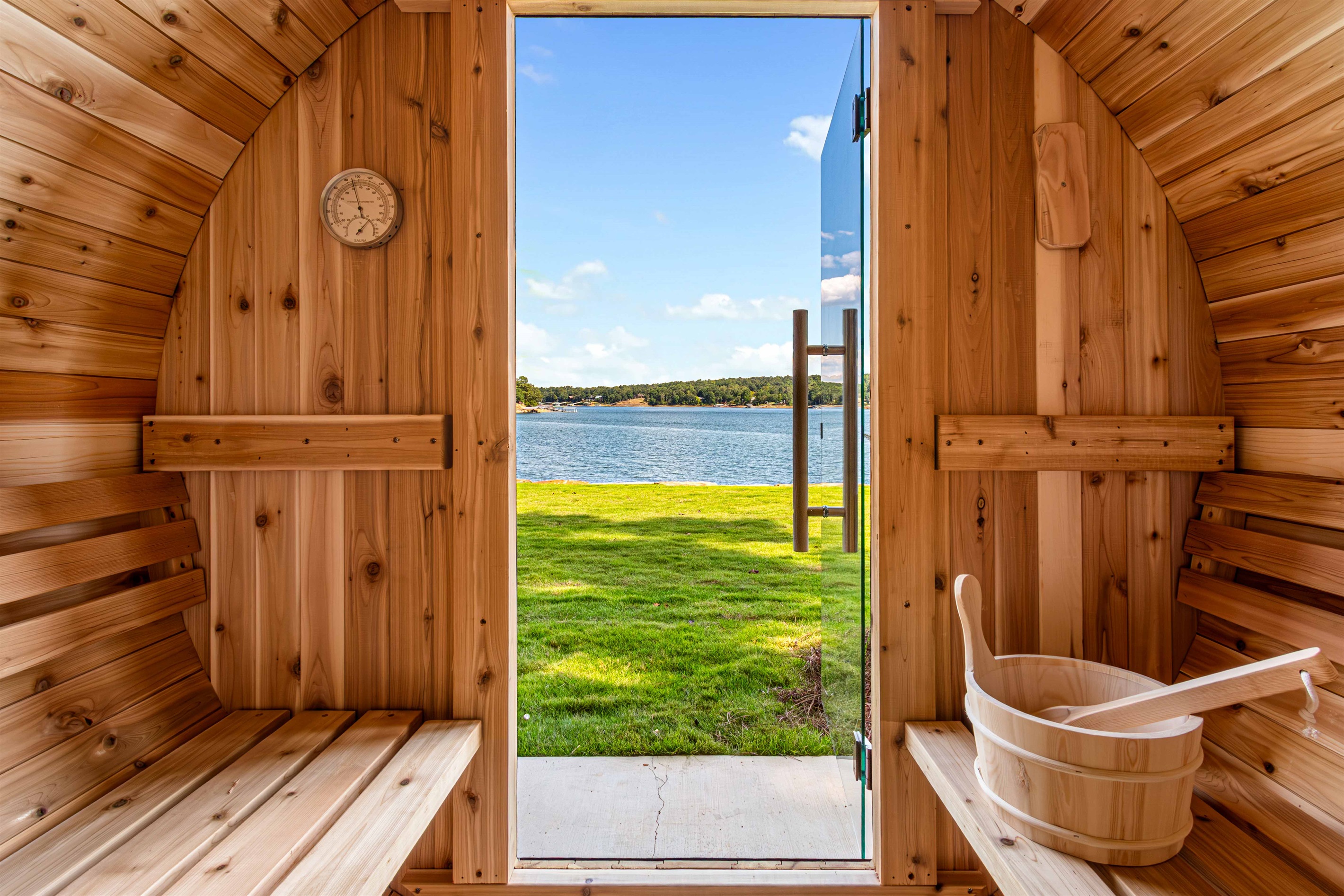 Sweat, breathe, and reset with lake views like these. This private barrel sauna is ready for you to detox, relax, and take in the serenity—one deep breath at a time.