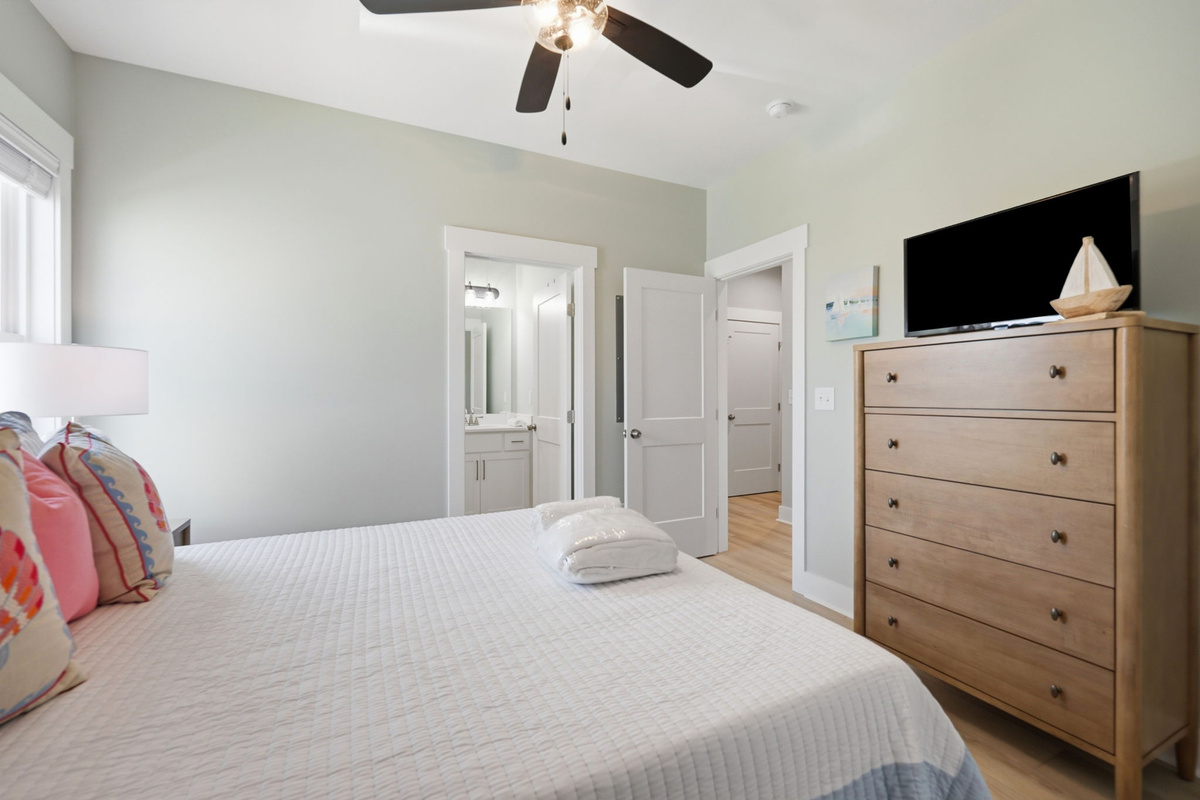 Relax in this inviting queen bedroom, complete with a Smart TV and convenient first-floor access