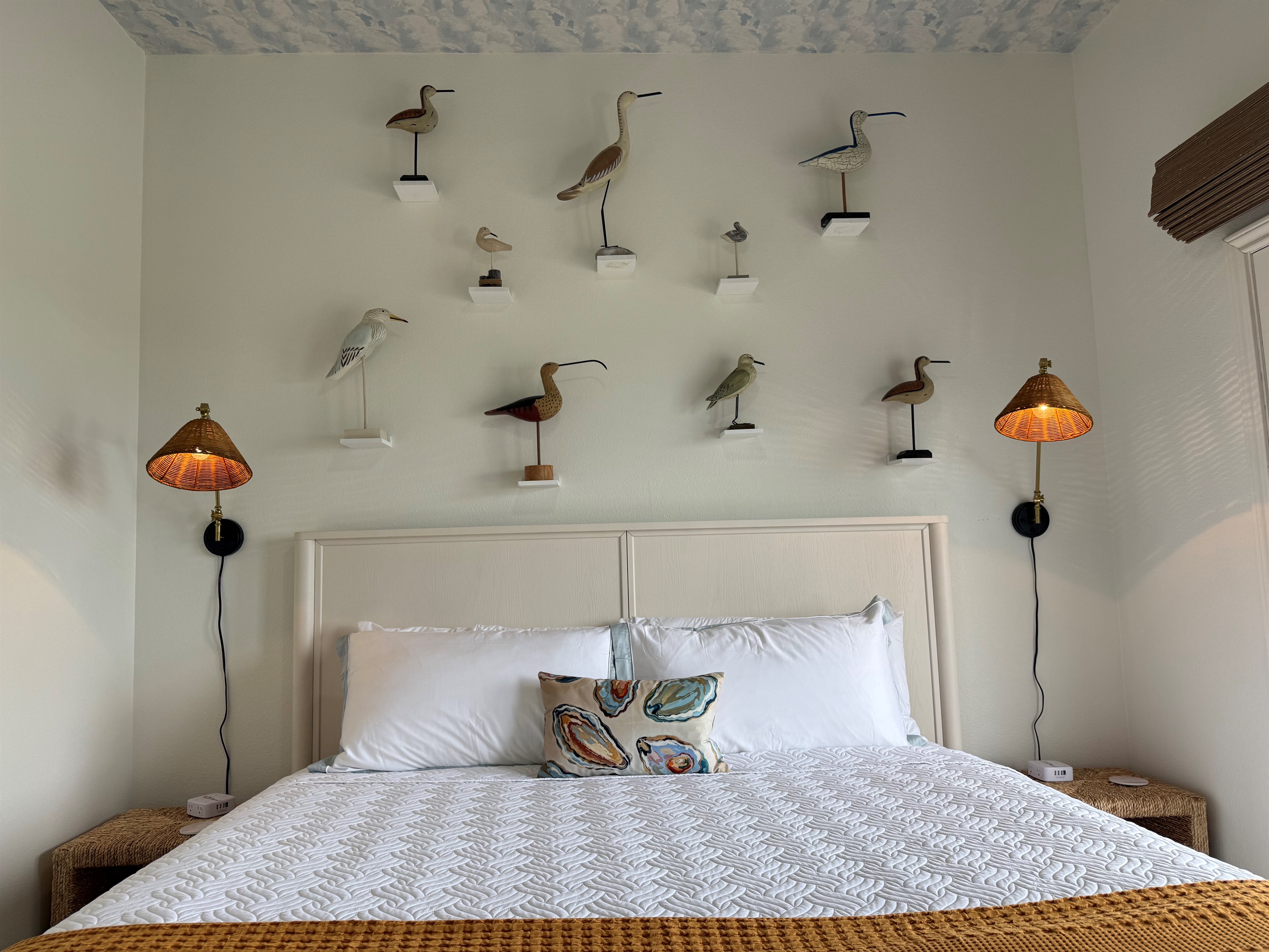 The Shorebird Room overlooks the Gulf, with deck access and remote control blinds.
