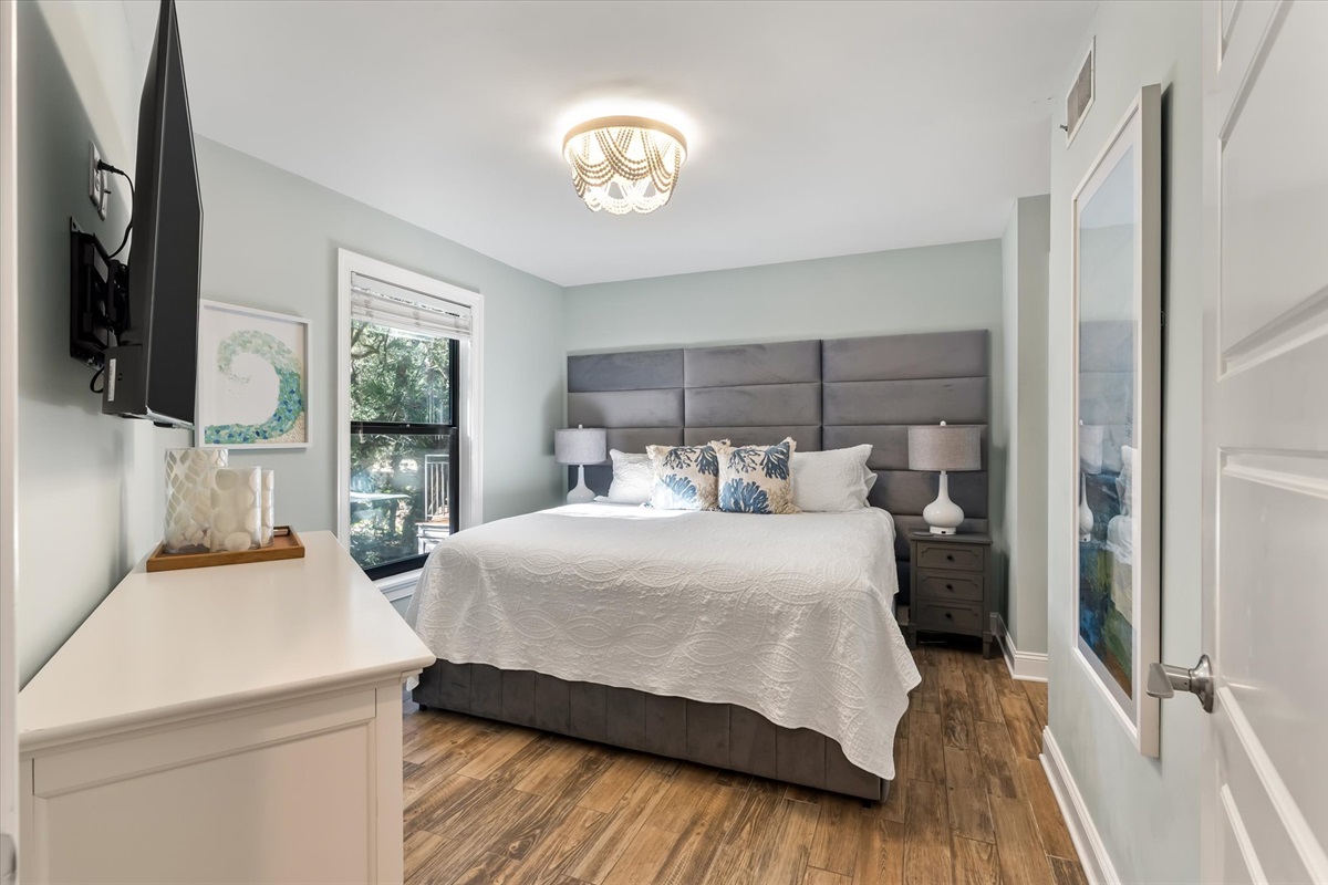 Primary suite with king bed and full bathroom
