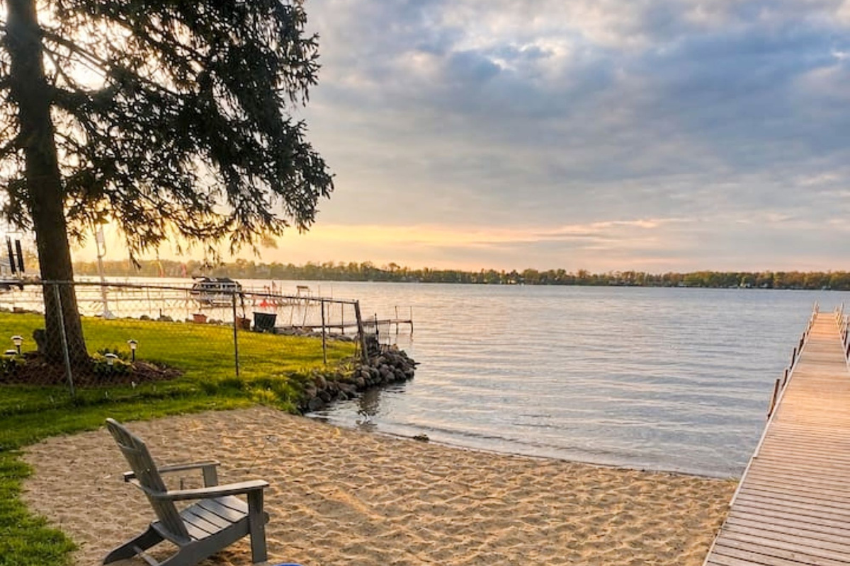 Beach area, boats will be on dock; This is a spring time photo. This area is shared with the few houses on the street. Dock is private and cannot be used. 