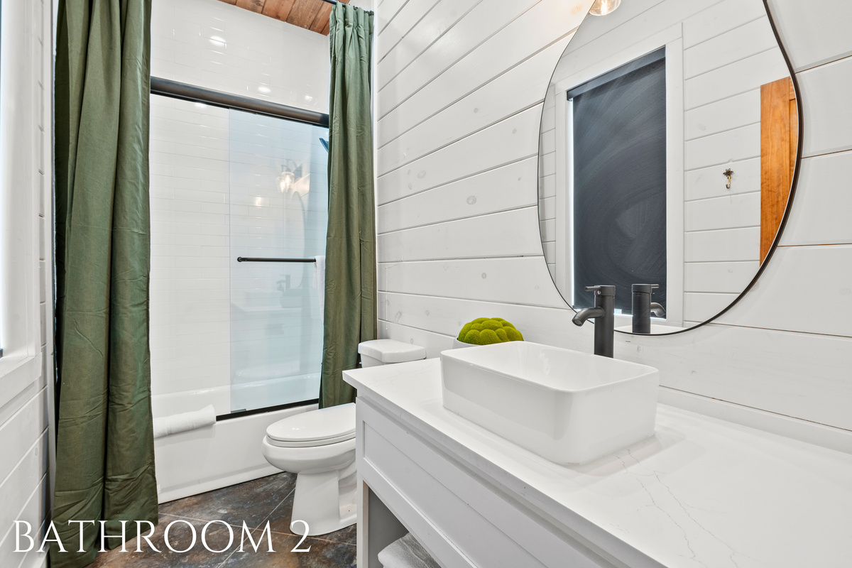 A sleek and contemporary bathroom with modern finishes and a minimalist design that feels fresh and bright.