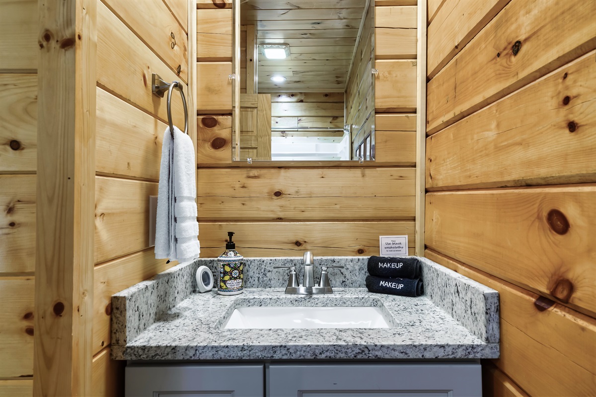The main floor bathroom offers shower, hand and make up towels for your convenience. 