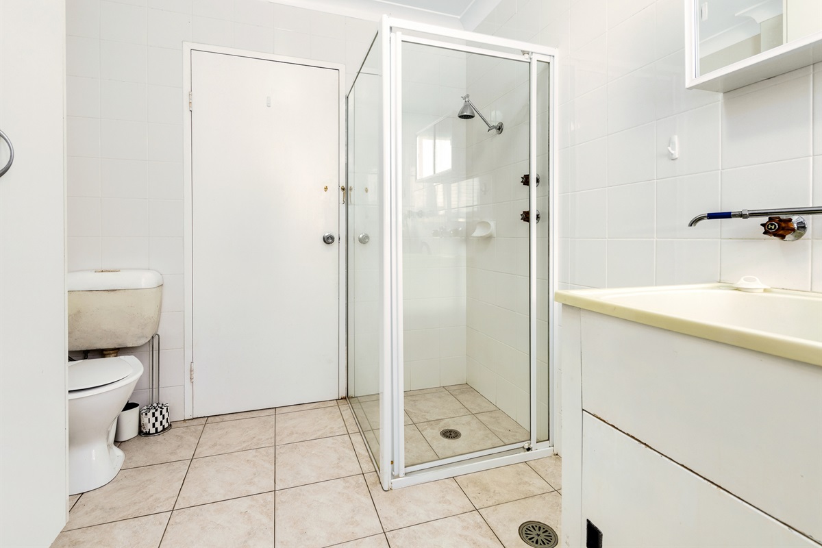 Having a full bathroom downstairs makes the two-level layout work well, especially with the fourth bedroom and rumpus room nearby.