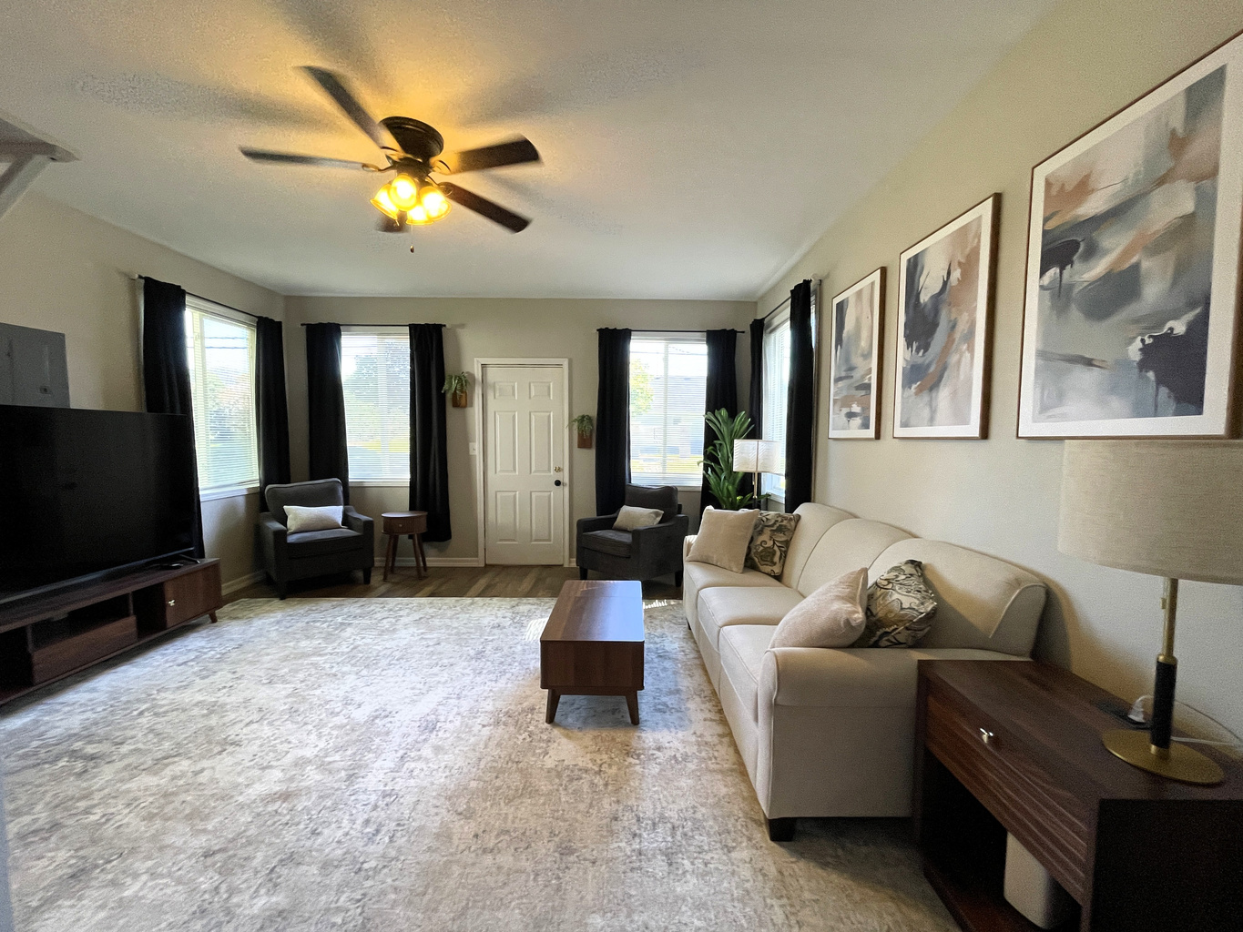 Spacious and Airy Living Room with 75" Smart TV