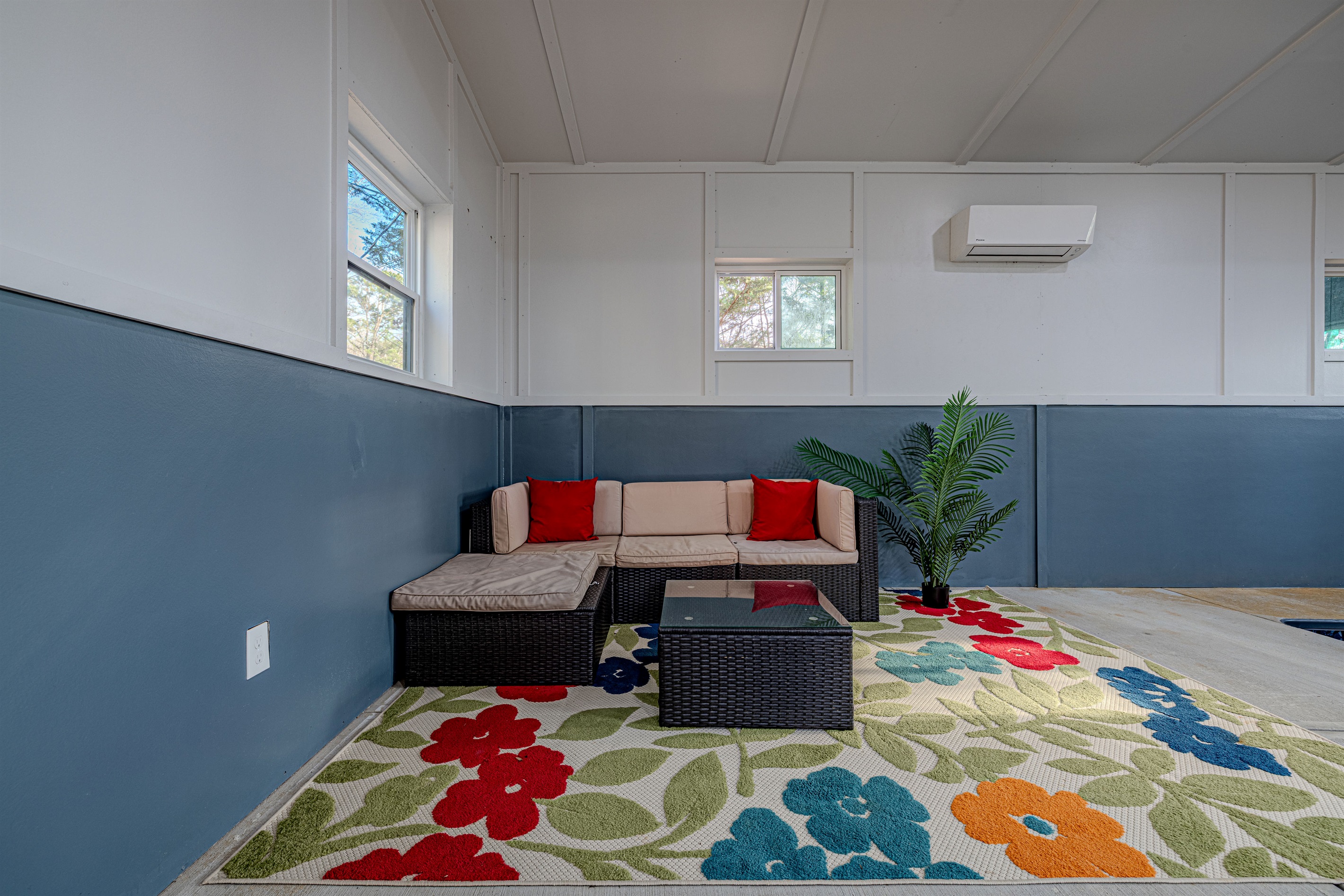 This versatile common area offers a low-profile coffee table and plush seating, ideal for morning coffee or evening board games.