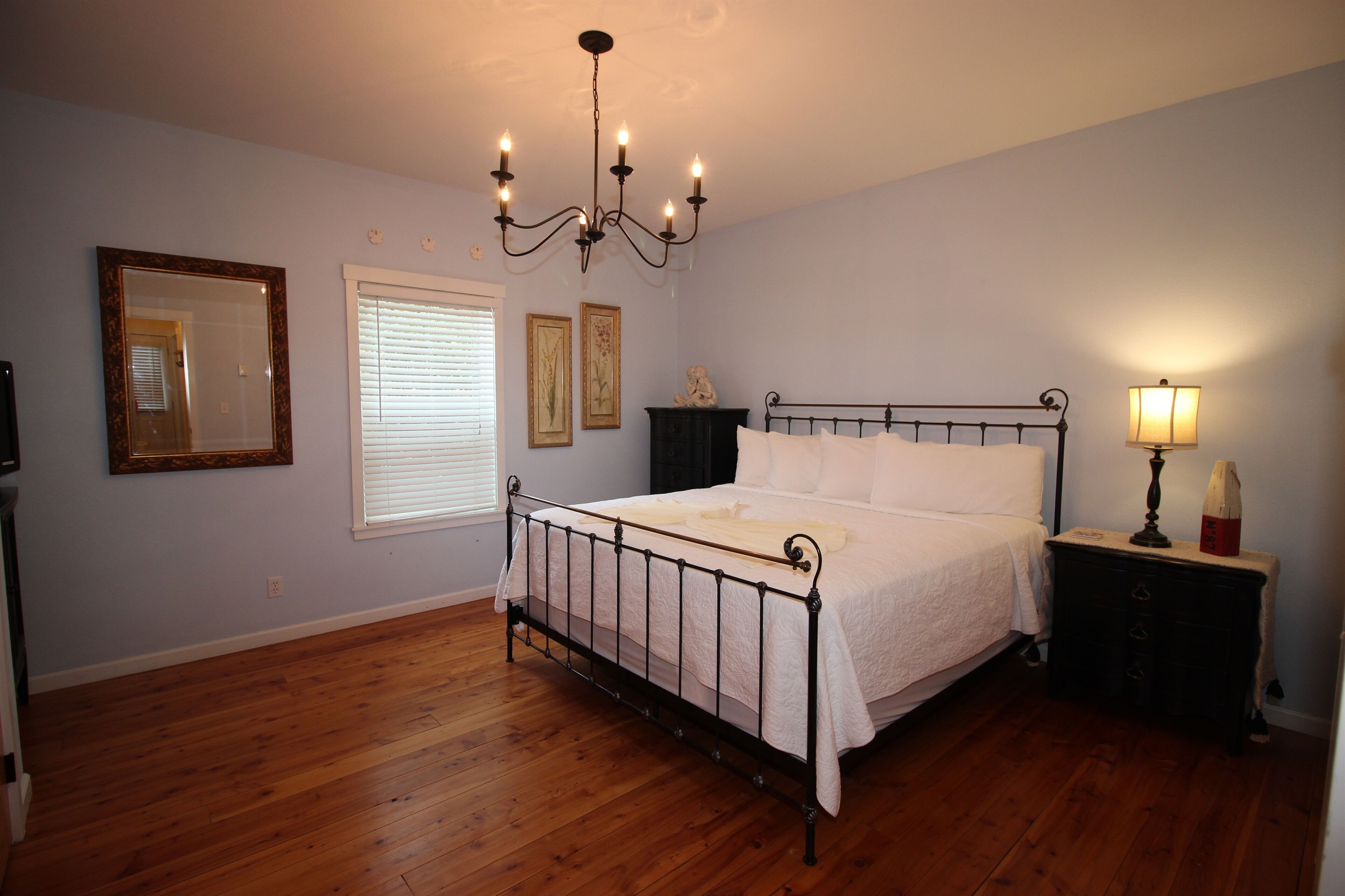 A spacious master suite to make you feel right at home with a TV to enjoy late night movies.