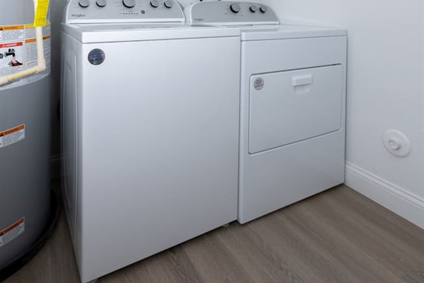 Laundry room has washer and dryer.