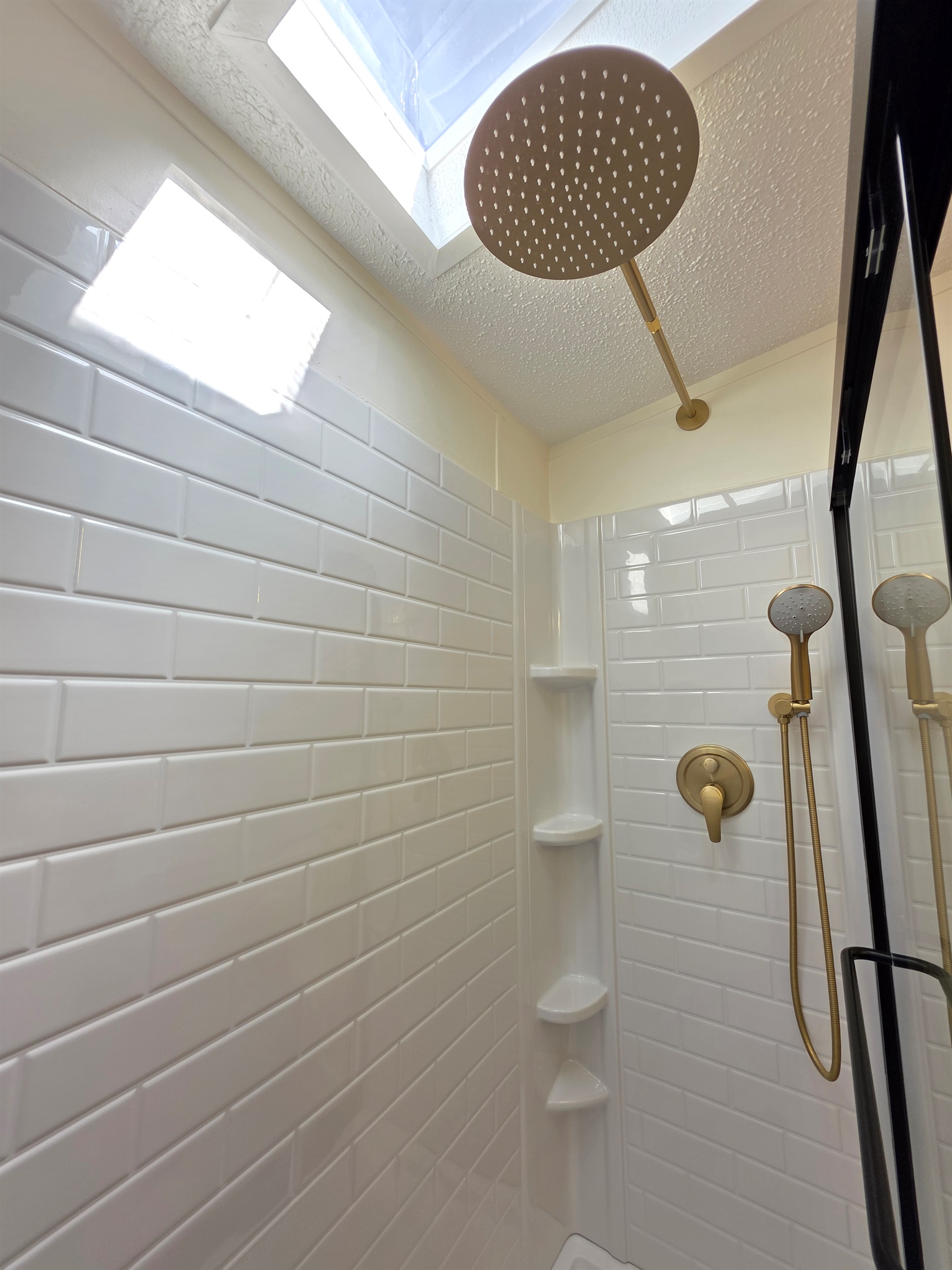 Shower with sky lights for lots of light.

