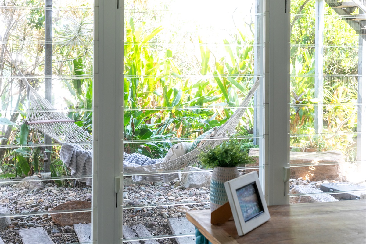 Sneak away to your own quiet spot in the tropical garden.