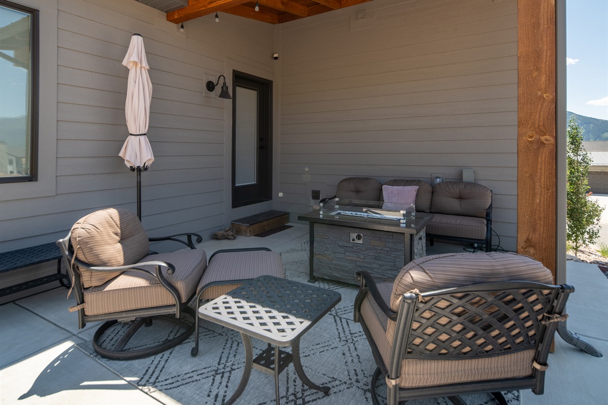 Shaded outdoor seating area perfect for relaxing or entertaining