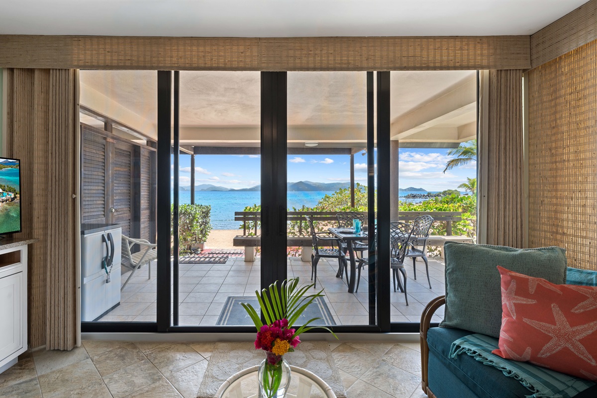 Sliding doors open to your private patio and ocean breeze