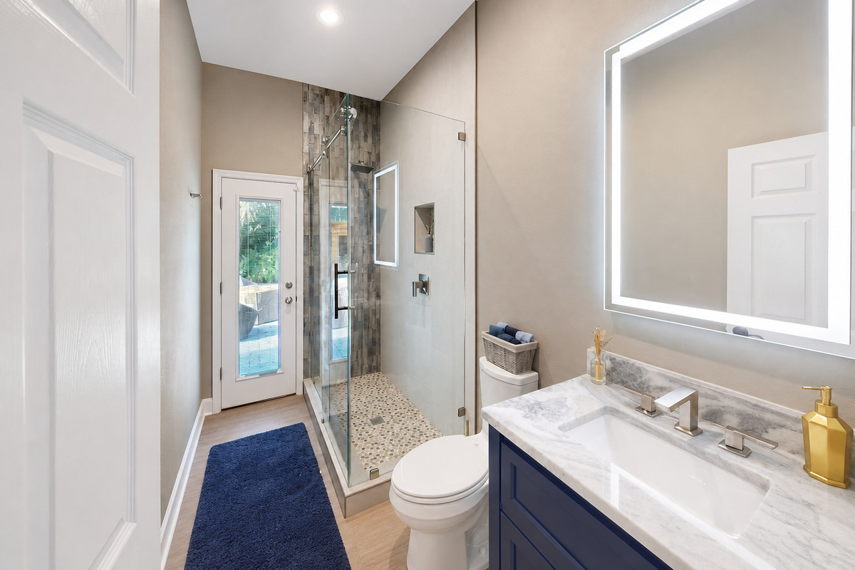 Clean hallway bathroom w/ fresh, modern touches.