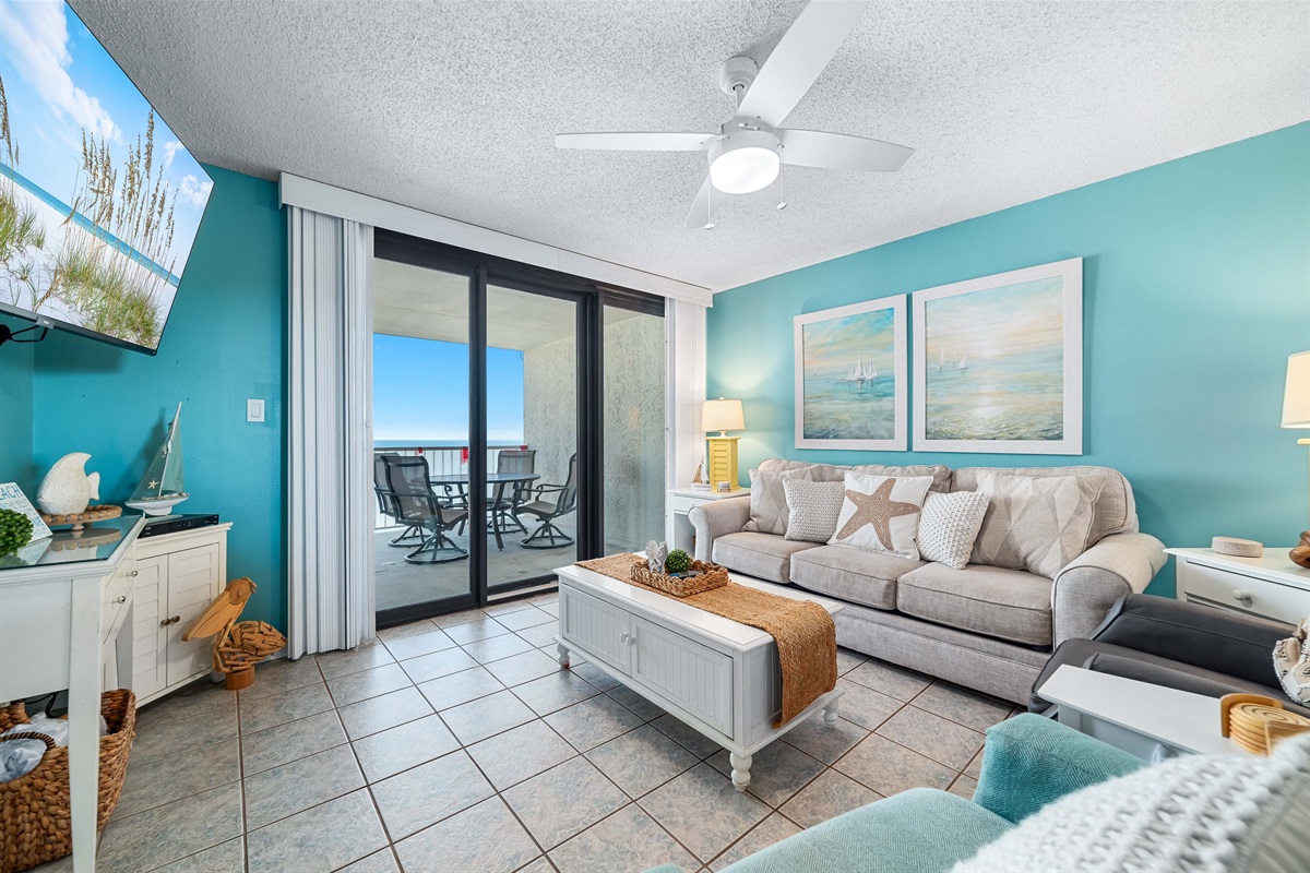 Relax and unwind in this inviting living space, complete with a comfortable sleeper sofa and breathtaking ocean views. Perfect for your next getaway!