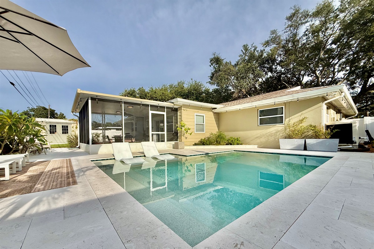 Whether you’re cooling off in the water or dining beneath the fan, this space is designed for maximum comfort.