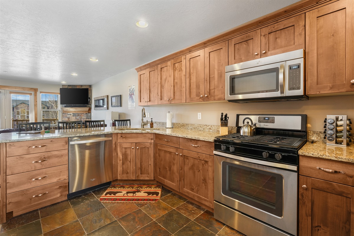 Cook with ease in this spacious kitchen featuring modern appliances and everything you need.