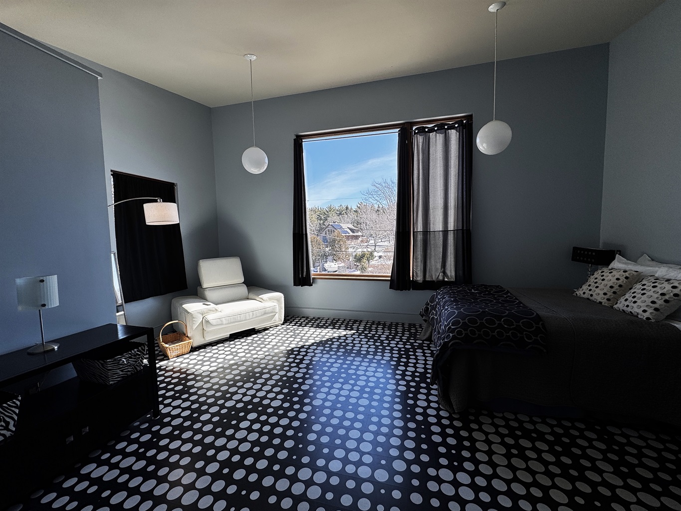 Reach the summit of "The Crag" in our iconic Sky Loft. Ascend the Sky Passage to this third-floor designer sanctuary, featuring a Queen bed, bold graphic laminate flooring, and bird’s-eye views of historic Otter Creek and the Acadia wilderness.