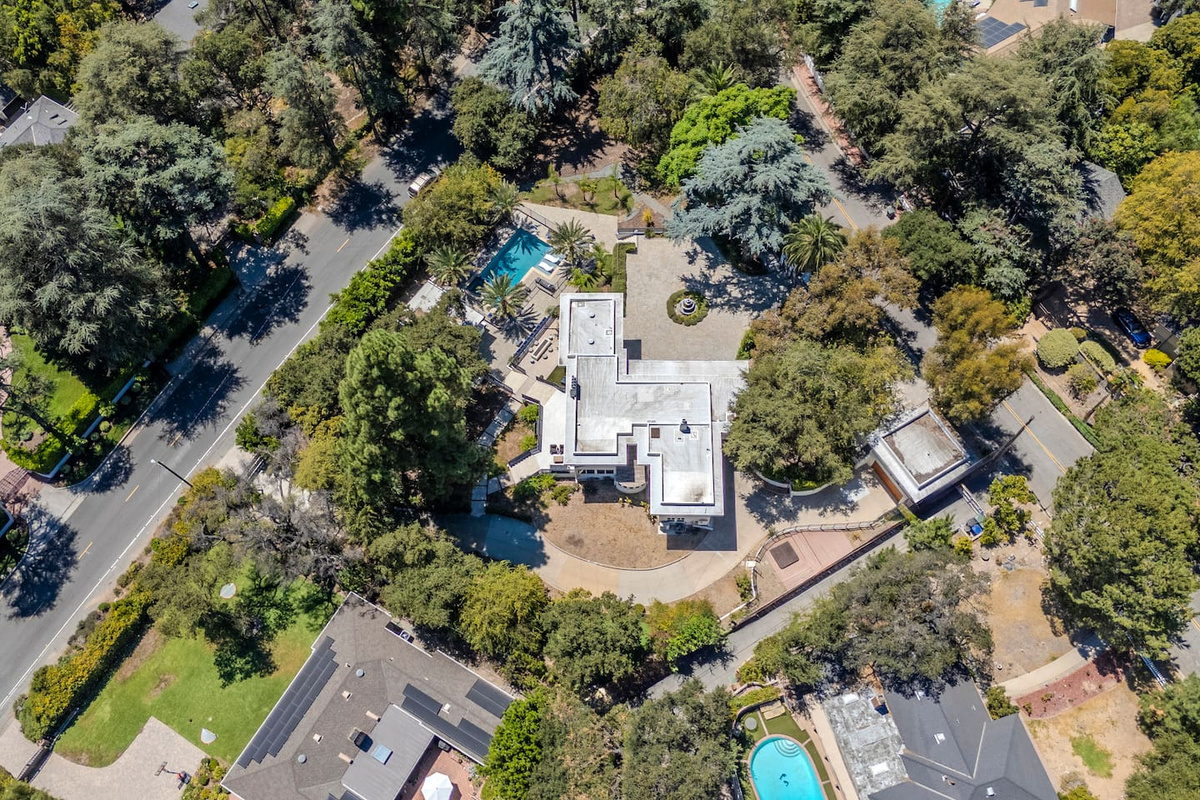 Aerial View Featuring the Home & Pool
