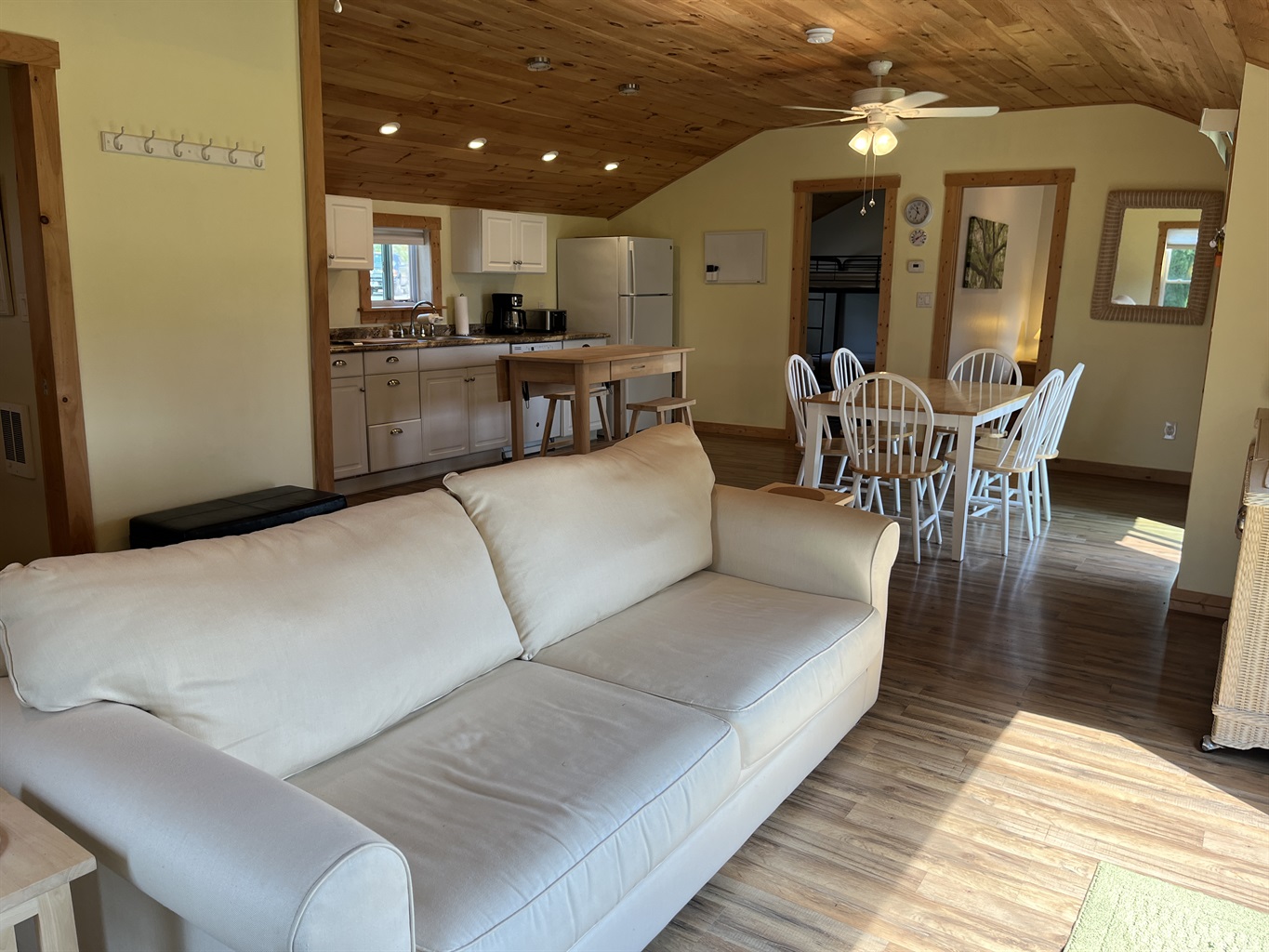Open concept living, dining and kitchen areas