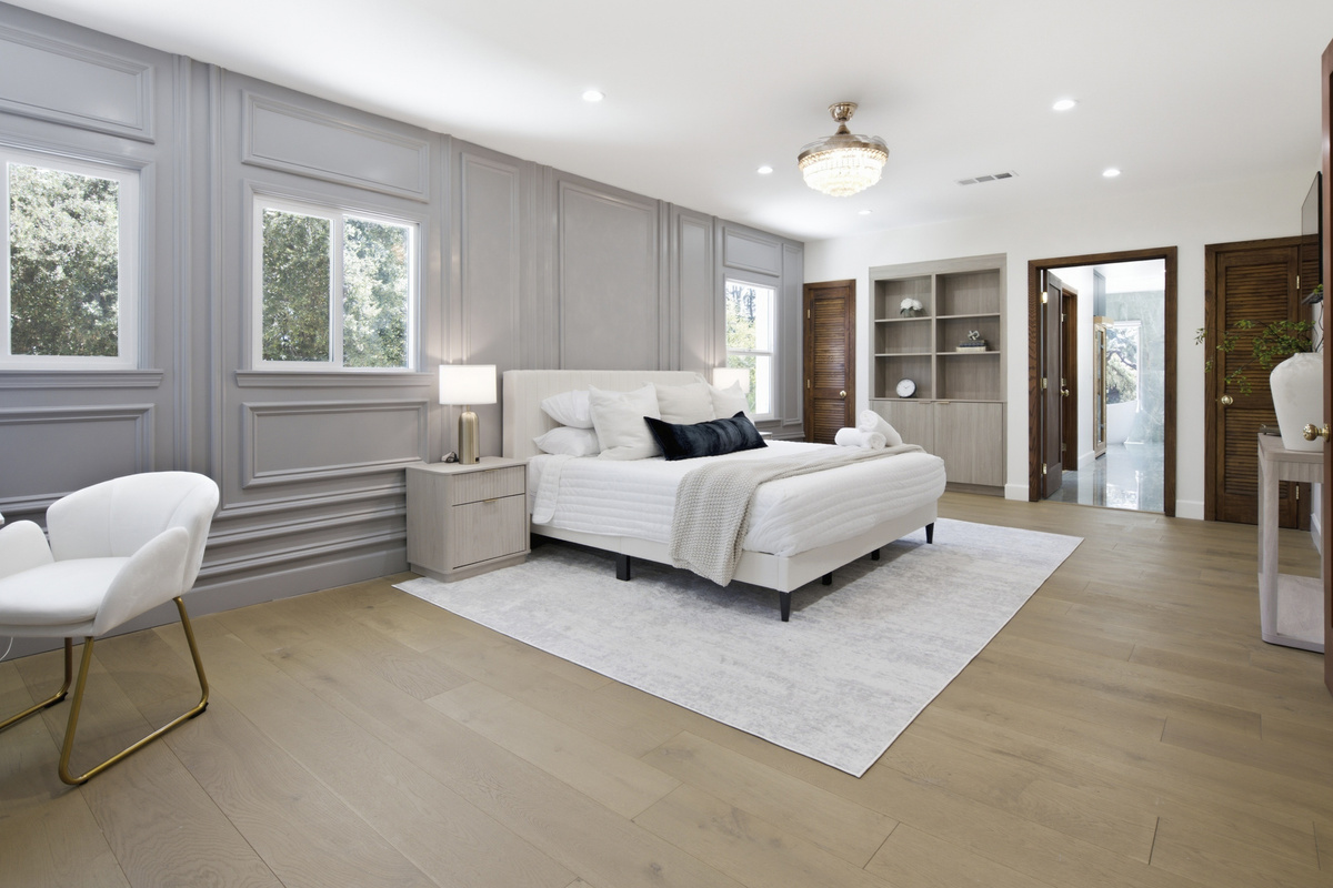 Settle into a beautifully styled bedroom made for comfort and relaxation.