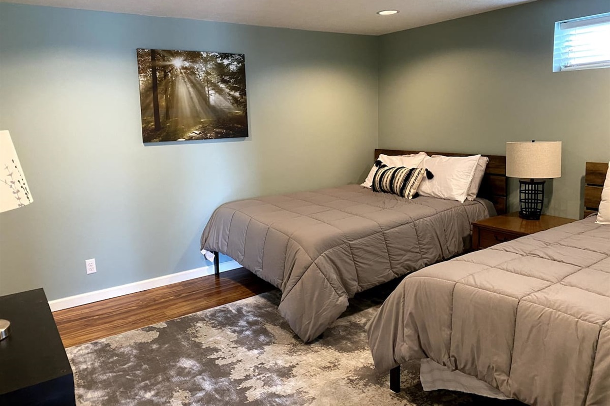 Wake up to views and fresh air—2 queen beds and a walk-out right from your room 