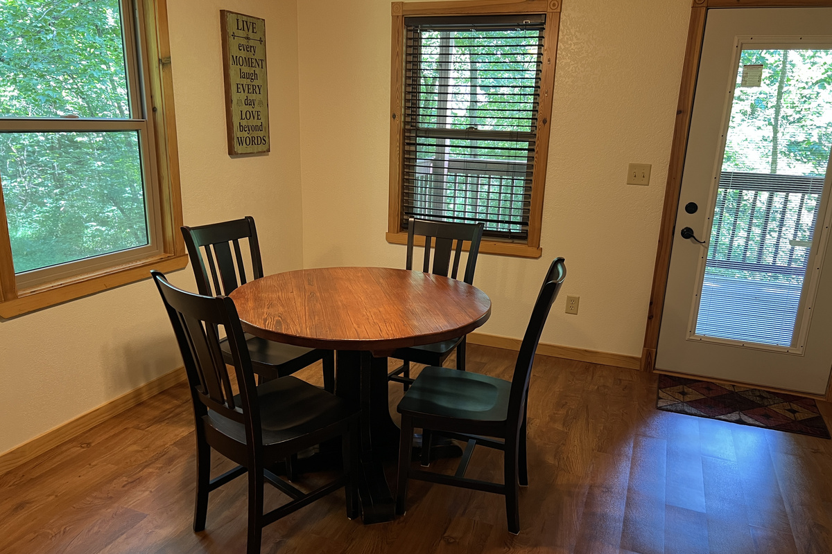 Game table in entertainment area showing lower deck access door