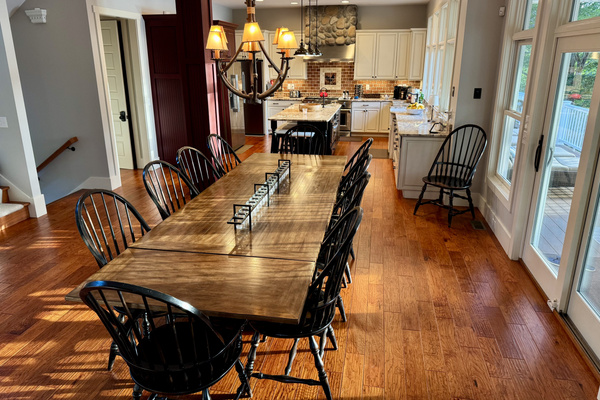 Centrally located between the kitchen and great room, perfect for shared meals and conversation